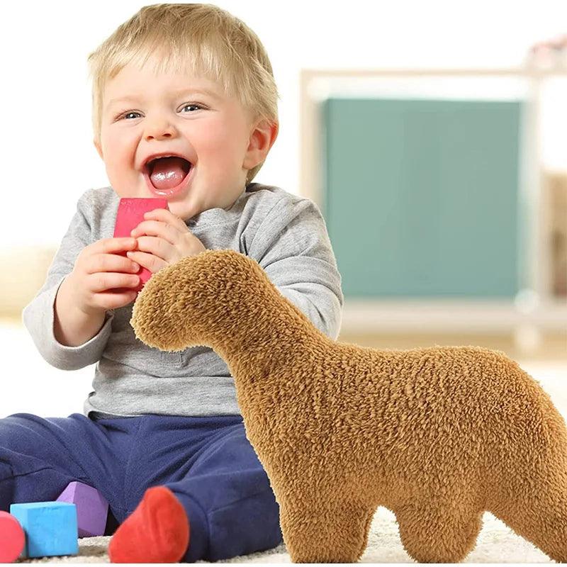 A baby playing with a Nugget Pillow Dinosaur Plush Pillow in the background. The pillow features a cartoon-style Tyrannosaurus design and adds a playful touch to the baby's play area - Eagalite