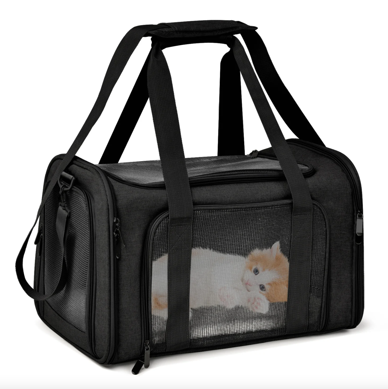 A black dog carrier bag with claw-defense mesh panels on the top and sides, featuring reinforced polyester and an adjustable shoulder strap - Eagalite