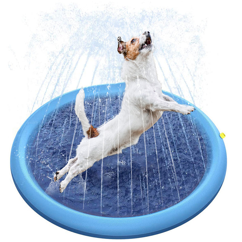 Dog enjoying a cooling playtime on a blue inflatable sprinkler pad with water spraying around - Eagalite